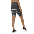 Load image into Gallery viewer, Introducing Elevated Essence Biker Shorts, the perfect choice for the active woman on-the-go! These shorts feature a high-rise waistband that smooths and supports your figure while providing maximum comfort during any activity. The unique design of white lines traversing dark grey fabric not only looks stylish but also elevates your spirit, making you feel confident and empowered.