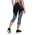 Load image into Gallery viewer, Experience the perfect blend of style and functionality with our Azure Intuition Capri Leggings. Made from a soft and stretchy fabric blend, these leggings offer a comfortable and supportive fit. The high waistband and mid-calf length provide coverage and freedom of movement. With their captivating pattern, these leggings add a touch of elegance to your active wardrobe.