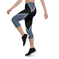 Load image into Gallery viewer, Experience the perfect blend of style and functionality with our Azure Intuition Capri Leggings. Made from a soft and stretchy fabric blend, these leggings offer a comfortable and supportive fit. The high waistband and mid-calf length provide coverage and freedom of movement. With their captivating pattern, these leggings add a touch of elegance to your active wardrobe.