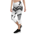 Load image into Gallery viewer, Experience the perfect blend of fashion and function with Neo Weave capri leggings. These leggings feature a dynamic, geometric design that will turn heads wherever you go. The breathable, moisture-wicking fabric will keep you cool and dry, while the form-fitting, high-rise cut will provide a flattering and comfortable fit.
