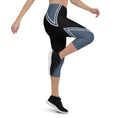 Load image into Gallery viewer, Experience the perfect blend of style and functionality with our Azure Intuition Capri Leggings. Made from a soft and stretchy fabric blend, these leggings offer a comfortable and supportive fit. The high waistband and mid-calf length provide coverage and freedom of movement. With their captivating pattern, these leggings add a touch of elegance to your active wardrobe.