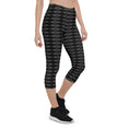 Load image into Gallery viewer, Step into a realm of style and confidence with our Checkmate capri leggings. These leggings are the perfect blend of fashion and functionality, designed to enhance your performance and make a bold statement.