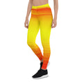 Load image into Gallery viewer, Bring the warmth of the sun with you wherever you go in our Sunset Sands leggings. Made with a comfortable microfiber yarn and four-way stretch, these leggings will keep you feeling comfortable and confident all day long.