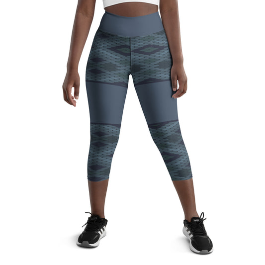 Looking for a pair of yoga capris that are both comfortable and stylish? Look no further than Blue Prism! Featuring a high, elastic waistband and a unique diamond scale pattern in various shades of blue, these capris provide a flattering fit and easy movement for any workout or lounging session.