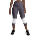 Load image into Gallery viewer, Indulge in sweet dreams with Lavender Dreams yoga capri leggings. These leggings boast a delightful lavender color with eye-catching white banding. Perfect for yoga, the gym, or casual wear, these leggings offer a flattering fit and superior comfort that will make them your go-to choice.
