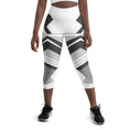 Load image into Gallery viewer, Discover the perfect blend of style and comfort with our Neo Weave yoga capris. These high-waisted capris feature a cutting-edge geometric design that's sure to turn heads at the gym or on the street. The quick-dry, moisture-wicking fabric keeps you cool and dry even during your toughest workouts, while the four-way stretch ensures unrestricted movement.