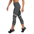 Load image into Gallery viewer, Elevate your active wardrobe with our Elevated Essence Yoga Capris. The sleek and comfortable design of these capris make them perfect for any activity, from hiking and biking to gardening and traveling. The high-quality fabric wicks away sweat and dries quickly, so you can stay comfortable during even the most intense workouts.
