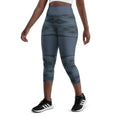 Load image into Gallery viewer, Looking for a pair of yoga capris that are both comfortable and stylish? Look no further than Blue Prism! Featuring a high, elastic waistband and a unique diamond scale pattern in various shades of blue, these capris provide a flattering fit and easy movement for any workout or lounging session.