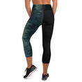 Load image into Gallery viewer, Evergreen Earth Capri Leggings, a tribute to the majesty and tranquility of nature. With their high, elastic waistband, these leggings are not only perfect for yoga and the gym, but also for exploring the great outdoors.