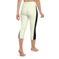Load image into Gallery viewer, Introducing our Lemon Slice Yoga Capris - the perfect blend of comfort and style for your active lifestyle. These capris feature a high, elastic waistband that ensures a secure and comfortable fit during any yoga pose or workout.