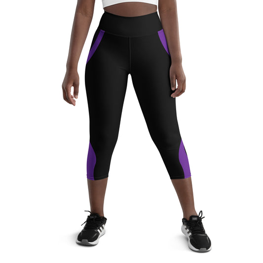 Experience comfort and style with our Midnight Hex Capri Leggings. These leggings feature a bold and unique design of purple curves and hexagon patterns on a sleek black background