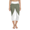 Load image into Gallery viewer, Elevate your workout wardrobe with these stylish and comfortable Emerald Lane capri leggings. Featuring a high, elastic waistband that hugs your curves and a four-way stretch microfiber fabric that moves with you, these leggings are perfect for yoga, the gym, or a cozy evening at home.