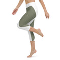 Load image into Gallery viewer, Elevate your workout wardrobe with these stylish and comfortable Emerald Lane capri leggings. Featuring a high, elastic waistband that hugs your curves and a four-way stretch microfiber fabric that moves with you, these leggings are perfect for yoga, the gym, or a cozy evening at home.
