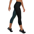 Load image into Gallery viewer, Evergreen Earth Capri Leggings, a tribute to the majesty and tranquility of nature. With their high, elastic waistband, these leggings are not only perfect for yoga and the gym, but also for exploring the great outdoors.