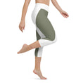 Load image into Gallery viewer, Elevate your workout wardrobe with these stylish and comfortable Emerald Lane capri leggings. Featuring a high, elastic waistband that hugs your curves and a four-way stretch microfiber fabric that moves with you, these leggings are perfect for yoga, the gym, or a cozy evening at home.