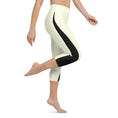 Load image into Gallery viewer, Introducing our Lemon Slice Yoga Capris - the perfect blend of comfort and style for your active lifestyle. These capris feature a high, elastic waistband that ensures a secure and comfortable fit during any yoga pose or workout.