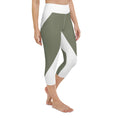 Load image into Gallery viewer, Elevate your workout wardrobe with these stylish and comfortable Emerald Lane capri leggings. Featuring a high, elastic waistband that hugs your curves and a four-way stretch microfiber fabric that moves with you, these leggings are perfect for yoga, the gym, or a cozy evening at home.