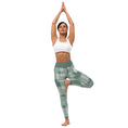 Load image into Gallery viewer, Experience ultimate comfort and style during your next yoga session with our Super Soft Yoga Leggings. Made with a luxurious blend of 82% polyester and 18% spandex, these leggings offer a four-way stretch that moves with your body in all directions. Our smooth and comfortable microfiber yarn ensures that you can stay focused on your practice without any distraction