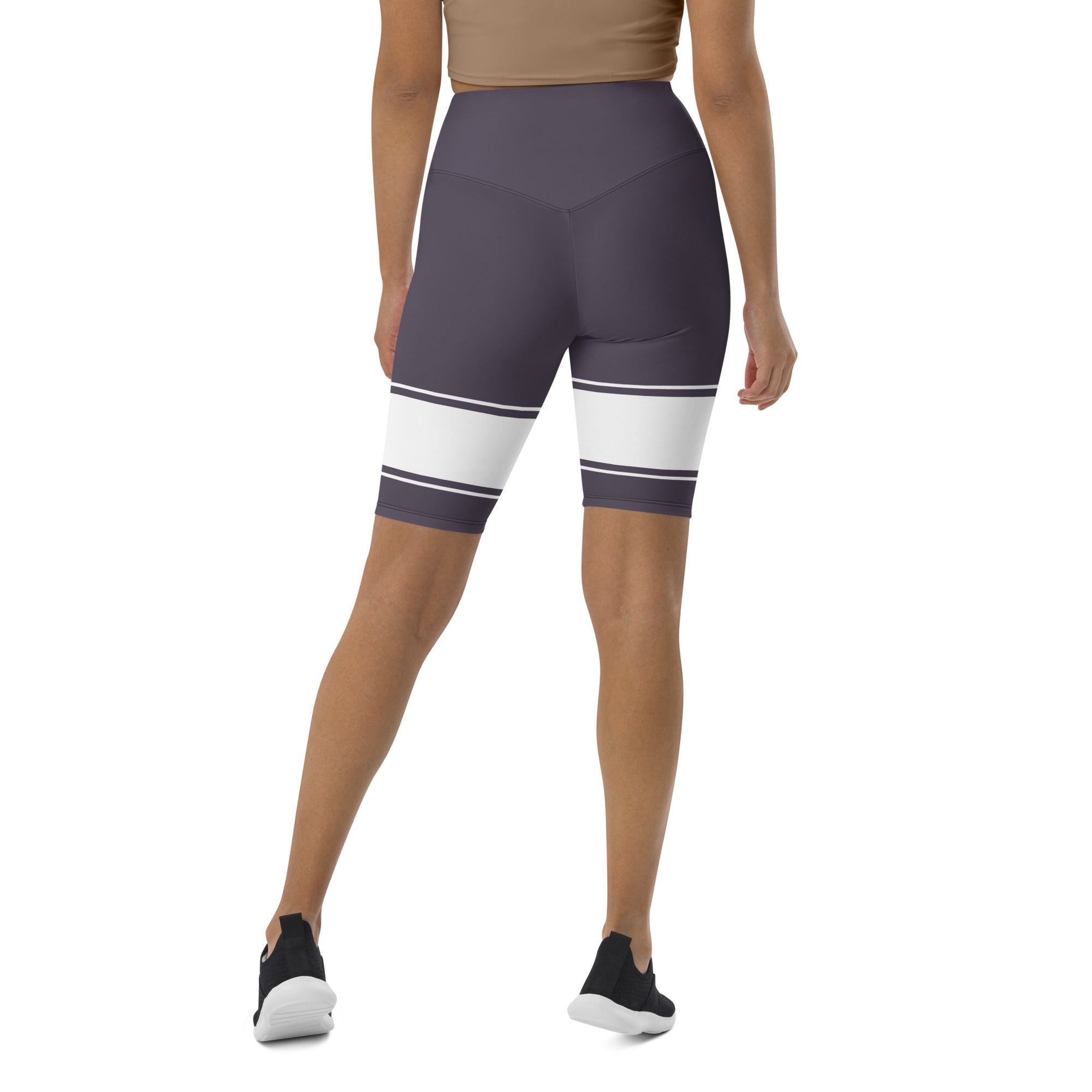 Whether you're running pavements or running errands, these Lavender Dreams biker shorts are the perfect choice. The comfortable, flexible fabric and high-rise waistband provide a flattering fit, while the white banding adds a touch of sophistication. Available in a range of sizes, these shorts are perfect for any body type.