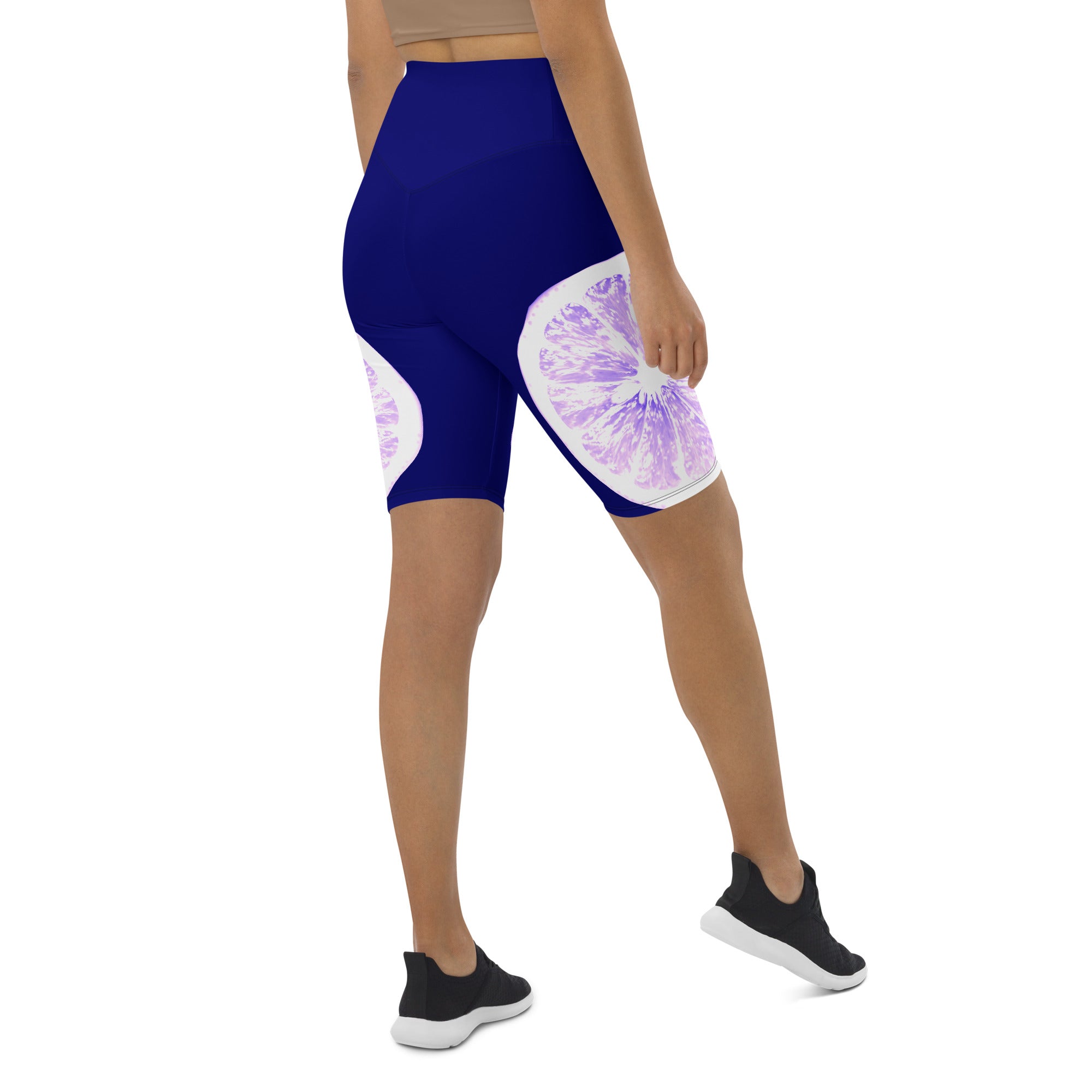 Rev up your workout wardrobe with these Citrus Burst biker shorts. Featuring bold and colorful pink grapefruits on a bright blue background, these shorts will add a playful touch to any active outfit.