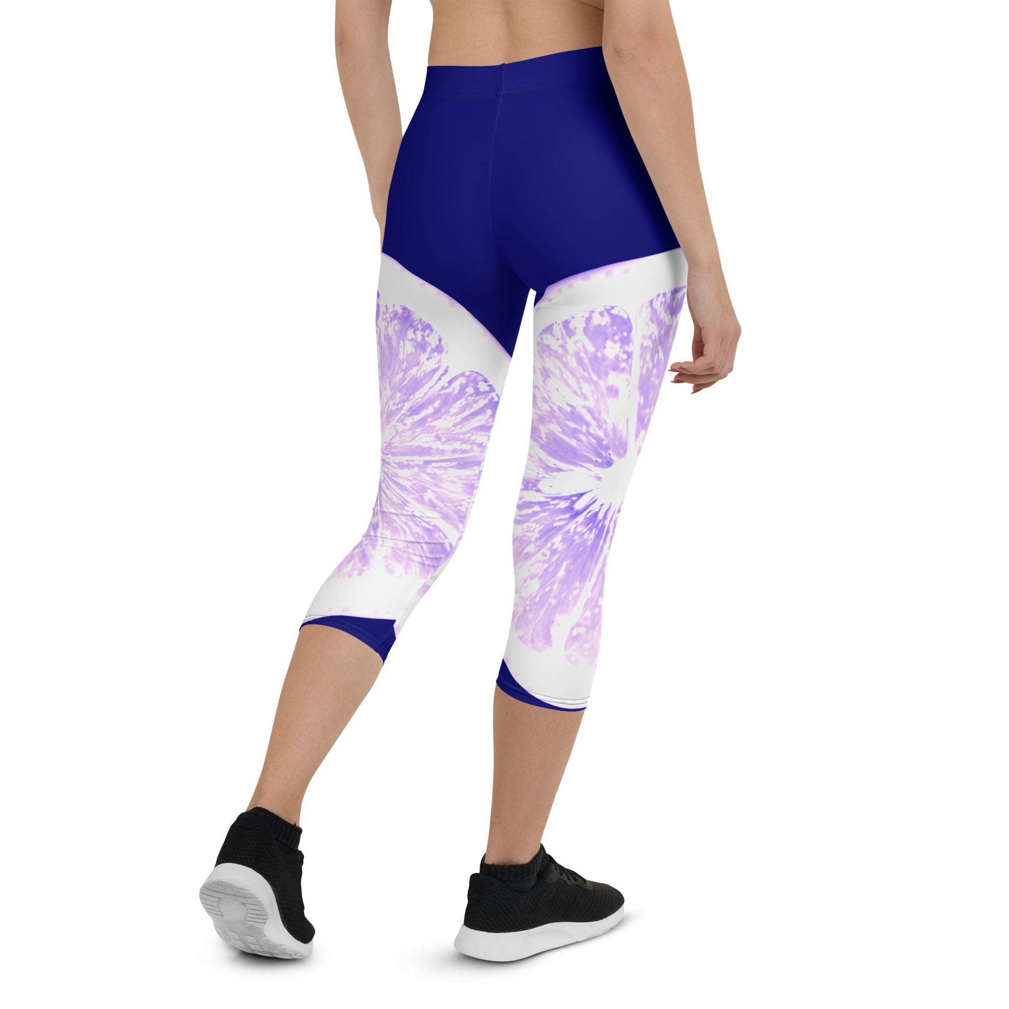 Add some zest to your activewear collection with these Citrus Burst capri leggings. The playful grapefruit print is sure to turn heads, while the super soft and stretchy fabric will keep you comfortable and supported during any activity.