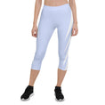 Load image into Gallery viewer, Picture yourself in a pair of Altitude capri leggings, the sky blue hue evoking feelings of soaring heights. The ultra-soft and stretchy fabric effortlessly hugs your curves, providing both comfort and style.
