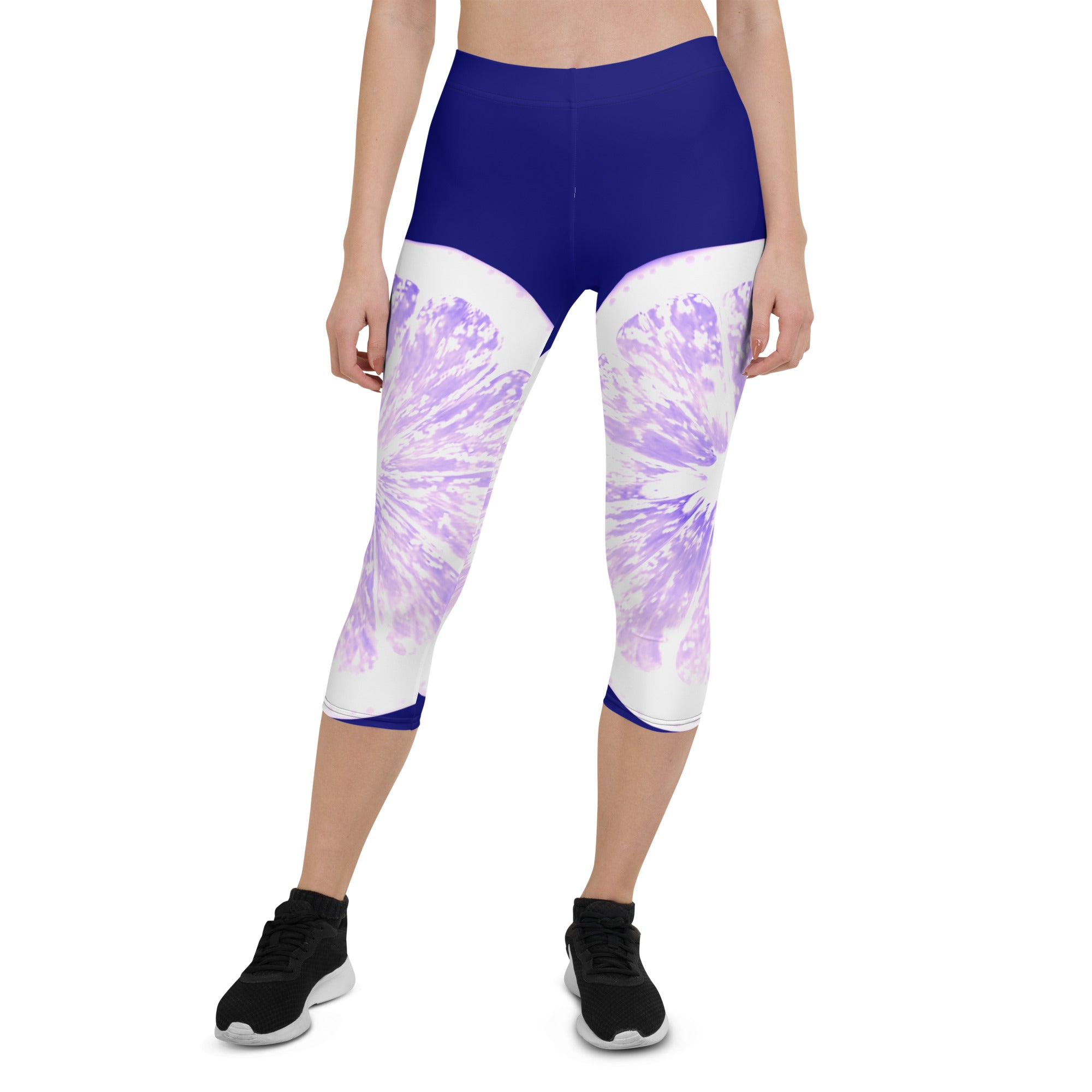 Add some zest to your activewear collection with these Citrus Burst capri leggings. The playful grapefruit print is sure to turn heads, while the super soft and stretchy fabric will keep you comfortable and supported during any activity.