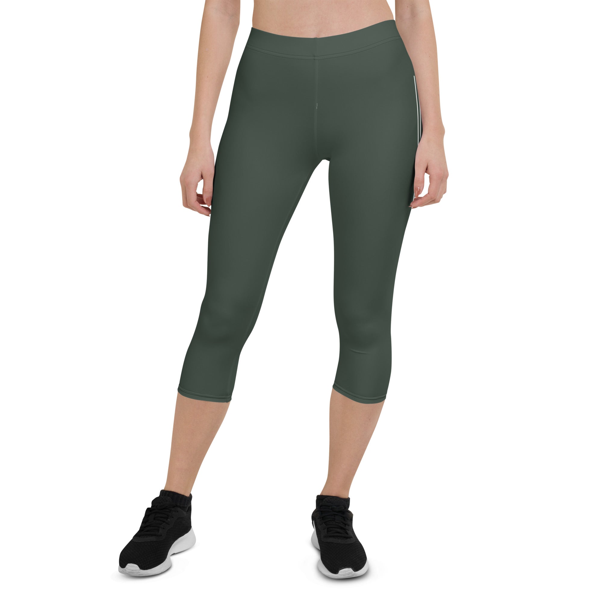 Introducing our Jade Ascent capri leggings - the ultimate companion for your yoga practice or morning jog. Crafted from a buttery-soft fabric, these leggings offer maximum flexibility and support, allowing you to move with complete ease and freedom.