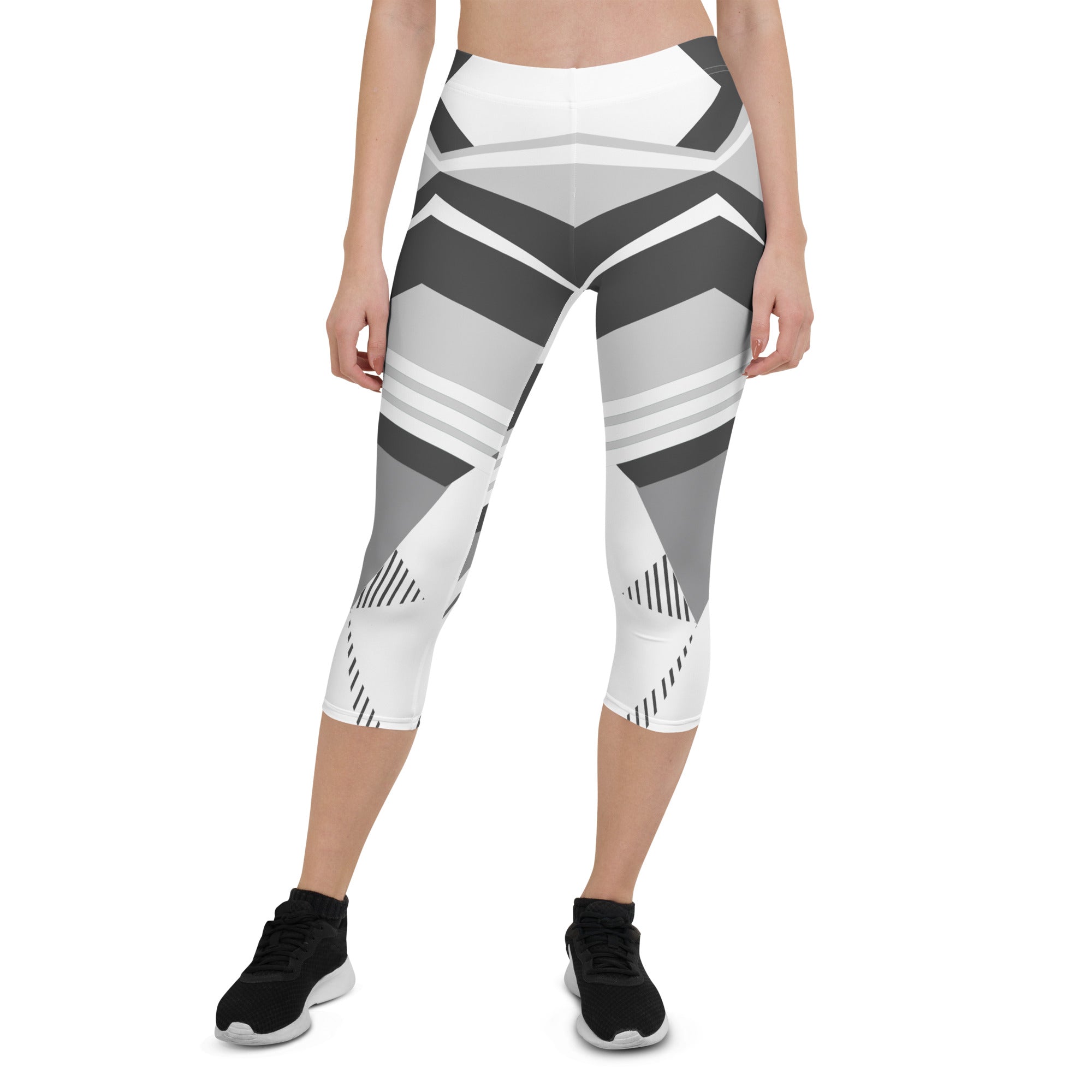 Experience the perfect blend of fashion and function with Neo Weave capri leggings. These leggings feature a dynamic, geometric design that will turn heads wherever you go. The breathable, moisture-wicking fabric will keep you cool and dry, while the form-fitting, high-rise cut will provide a flattering and comfortable fit.