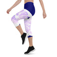 Load image into Gallery viewer, Add some zest to your activewear collection with these Citrus Burst capri leggings. The playful grapefruit print is sure to turn heads, while the super soft and stretchy fabric will keep you comfortable and supported during any activity.
