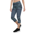 Load image into Gallery viewer, These Blue Prism capris are not just comfortable, they're also designed to keep you moving in style! With a trendy diamond-scale pattern in varying shades of blue, you'll feel energized and ready to take on any workout.
