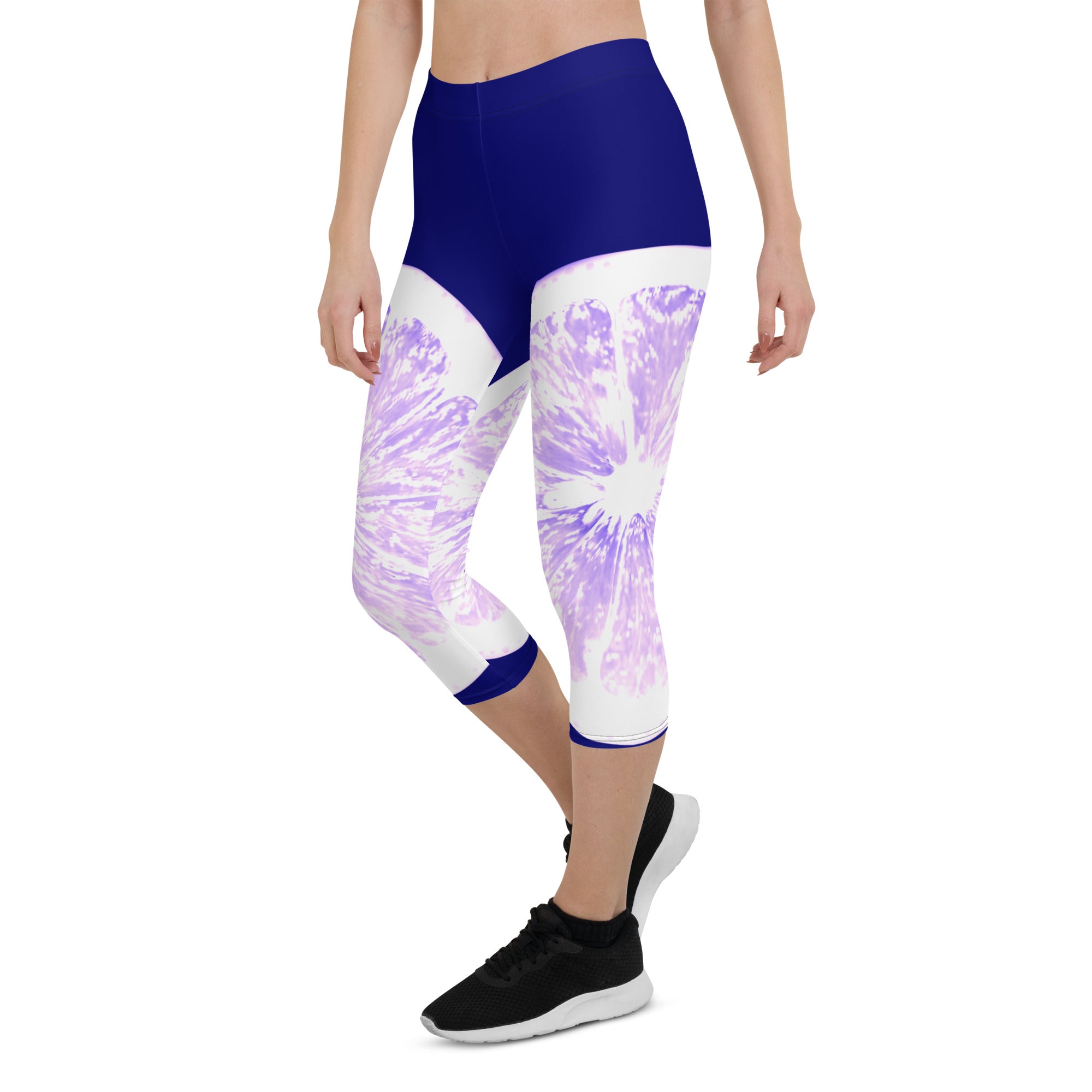 Add some zest to your activewear collection with these Citrus Burst capri leggings. The playful grapefruit print is sure to turn heads, while the super soft and stretchy fabric will keep you comfortable and supported during any activity.