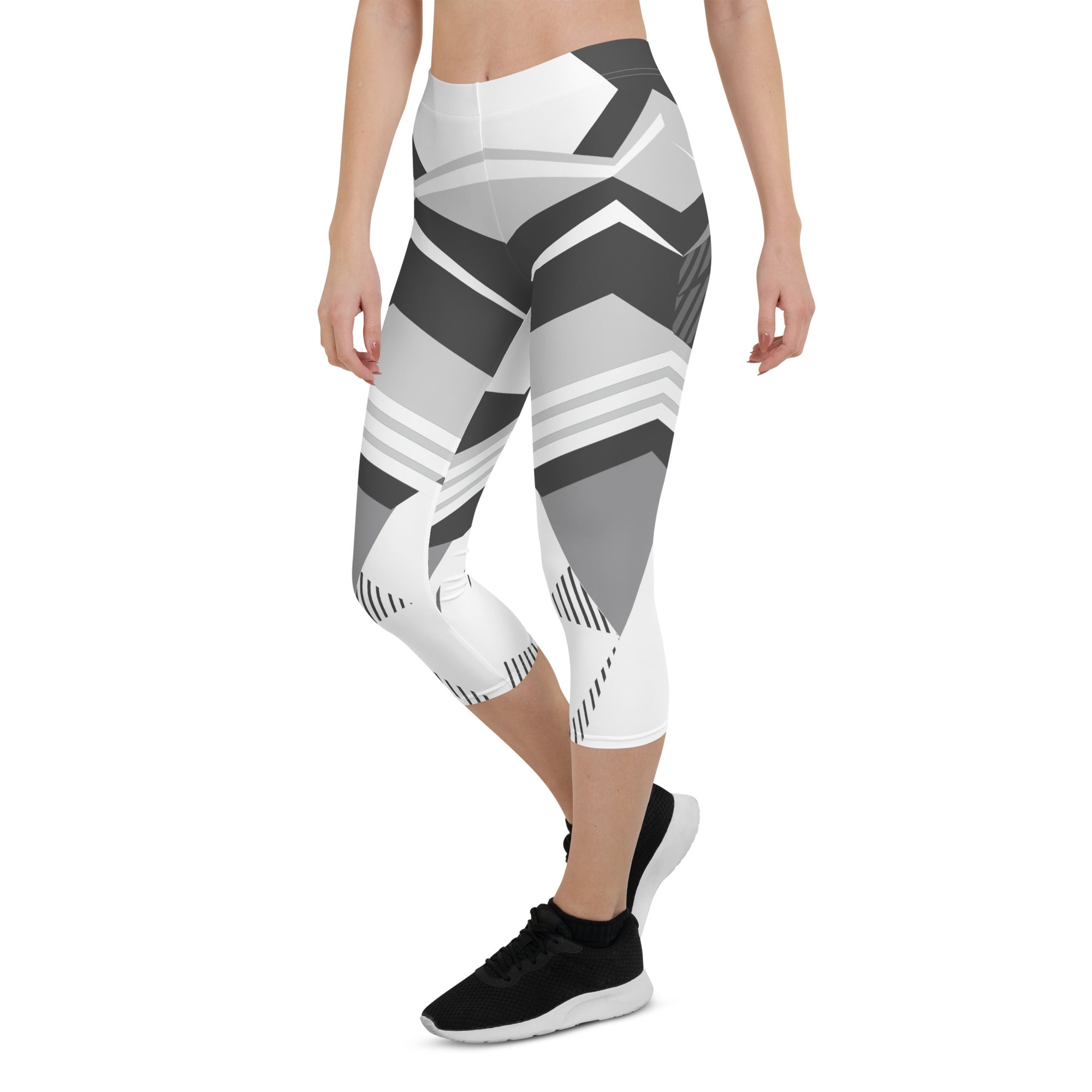 Experience the perfect blend of fashion and function with Neo Weave capri leggings. These leggings feature a dynamic, geometric design that will turn heads wherever you go. The breathable, moisture-wicking fabric will keep you cool and dry, while the form-fitting, high-rise cut will provide a flattering and comfortable fit.