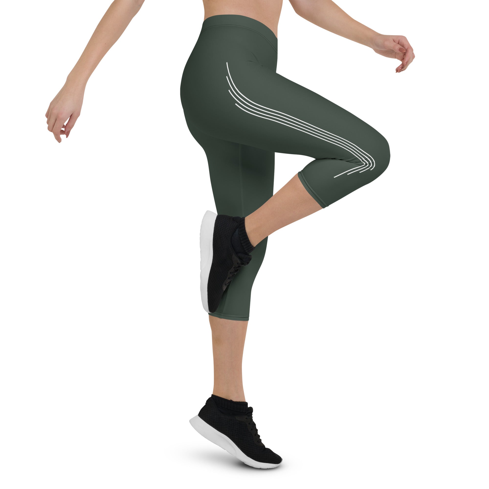 Introducing our Jade Ascent capri leggings - the ultimate companion for your yoga practice or morning jog. Crafted from a buttery-soft fabric, these leggings offer maximum flexibility and support, allowing you to move with complete ease and freedom.