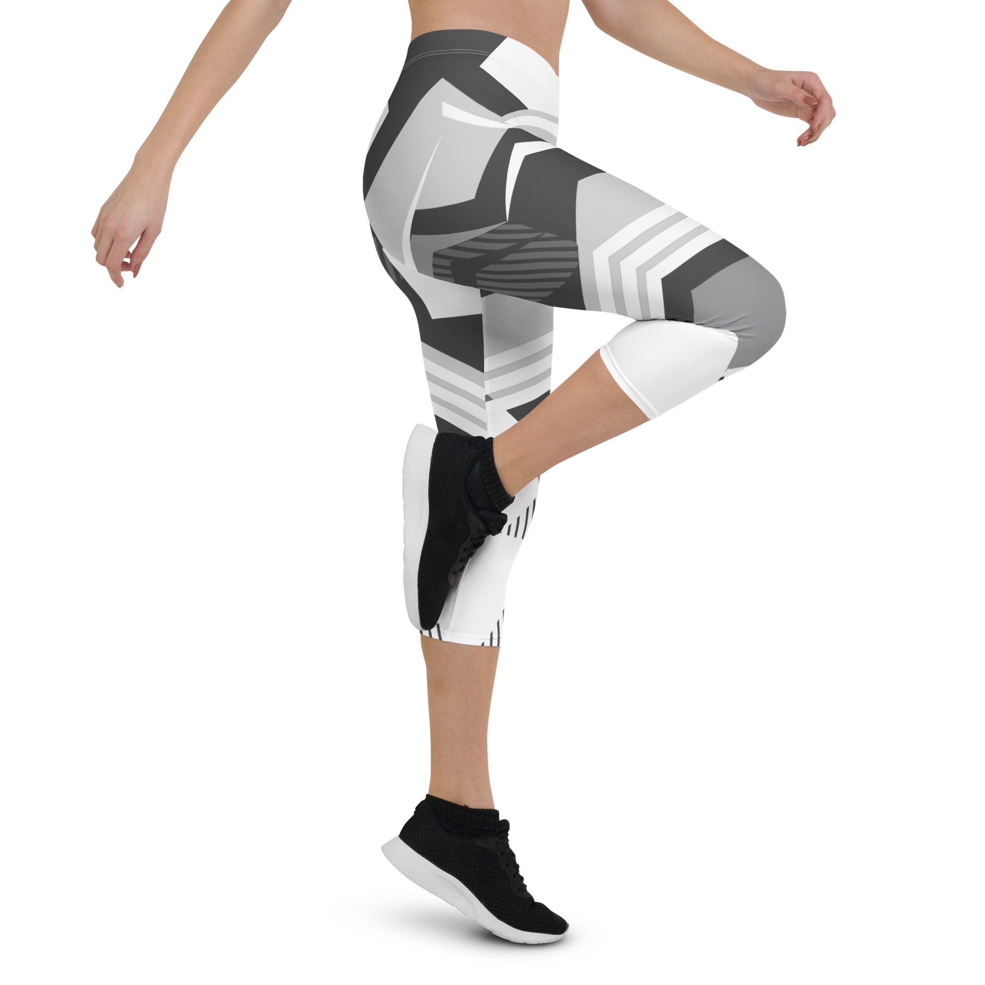 Experience the perfect blend of fashion and function with Neo Weave capri leggings. These leggings feature a dynamic, geometric design that will turn heads wherever you go. The breathable, moisture-wicking fabric will keep you cool and dry, while the form-fitting, high-rise cut will provide a flattering and comfortable fit.