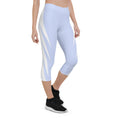 Load image into Gallery viewer, Picture yourself in a pair of Altitude capri leggings, the sky blue hue evoking feelings of soaring heights. The ultra-soft and stretchy fabric effortlessly hugs your curves, providing both comfort and style.
