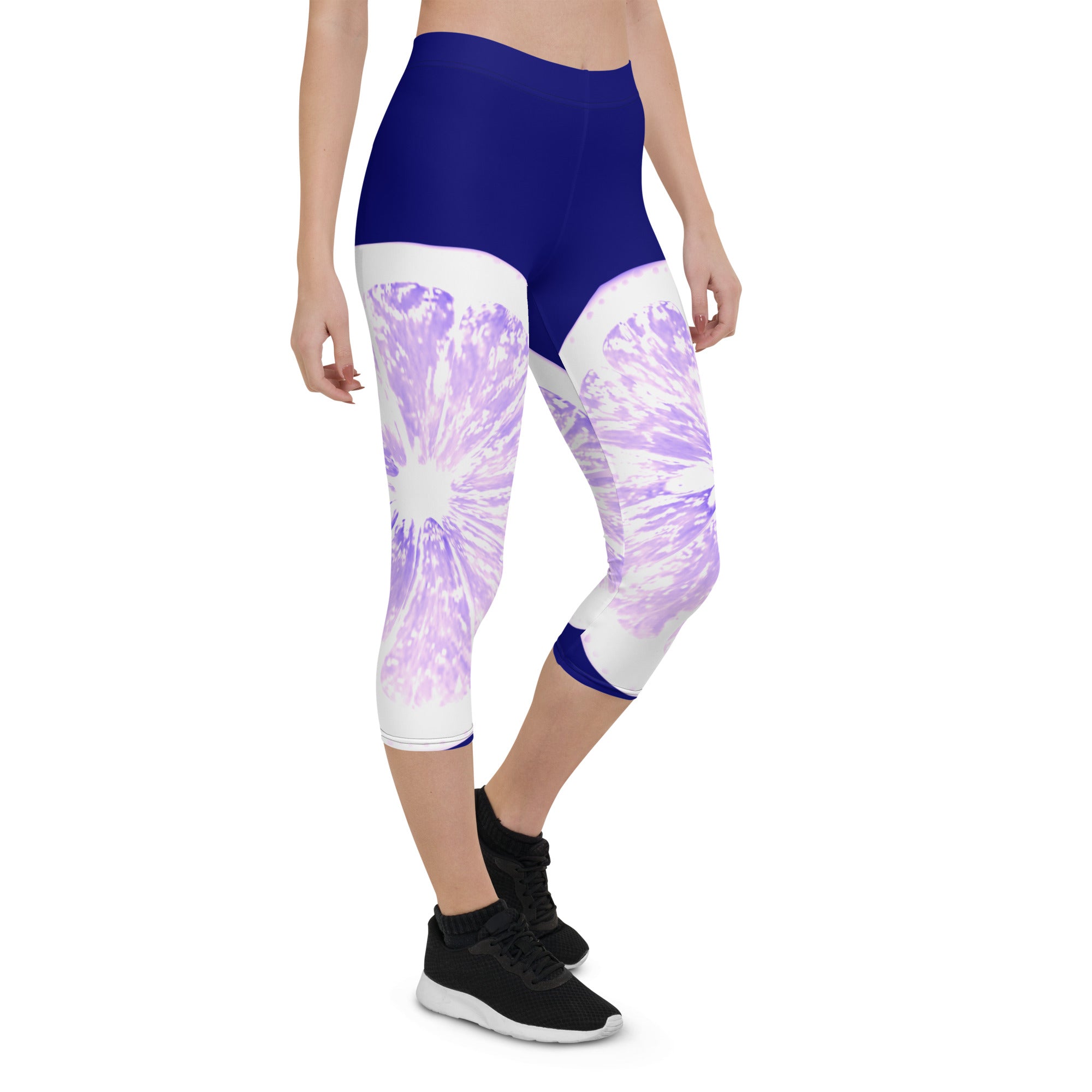 Add some zest to your activewear collection with these Citrus Burst capri leggings. The playful grapefruit print is sure to turn heads, while the super soft and stretchy fabric will keep you comfortable and supported during any activity.