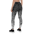 Load image into Gallery viewer, Introducing Stealth Leggings, where style and comfort merge seamlessly. These leggings are designed to elevate your active wardrobe with their sleek and captivating design. The unique camouflage pattern beneath a gradient that transitions from dark to light creates an eye-catching and dynamic lo
