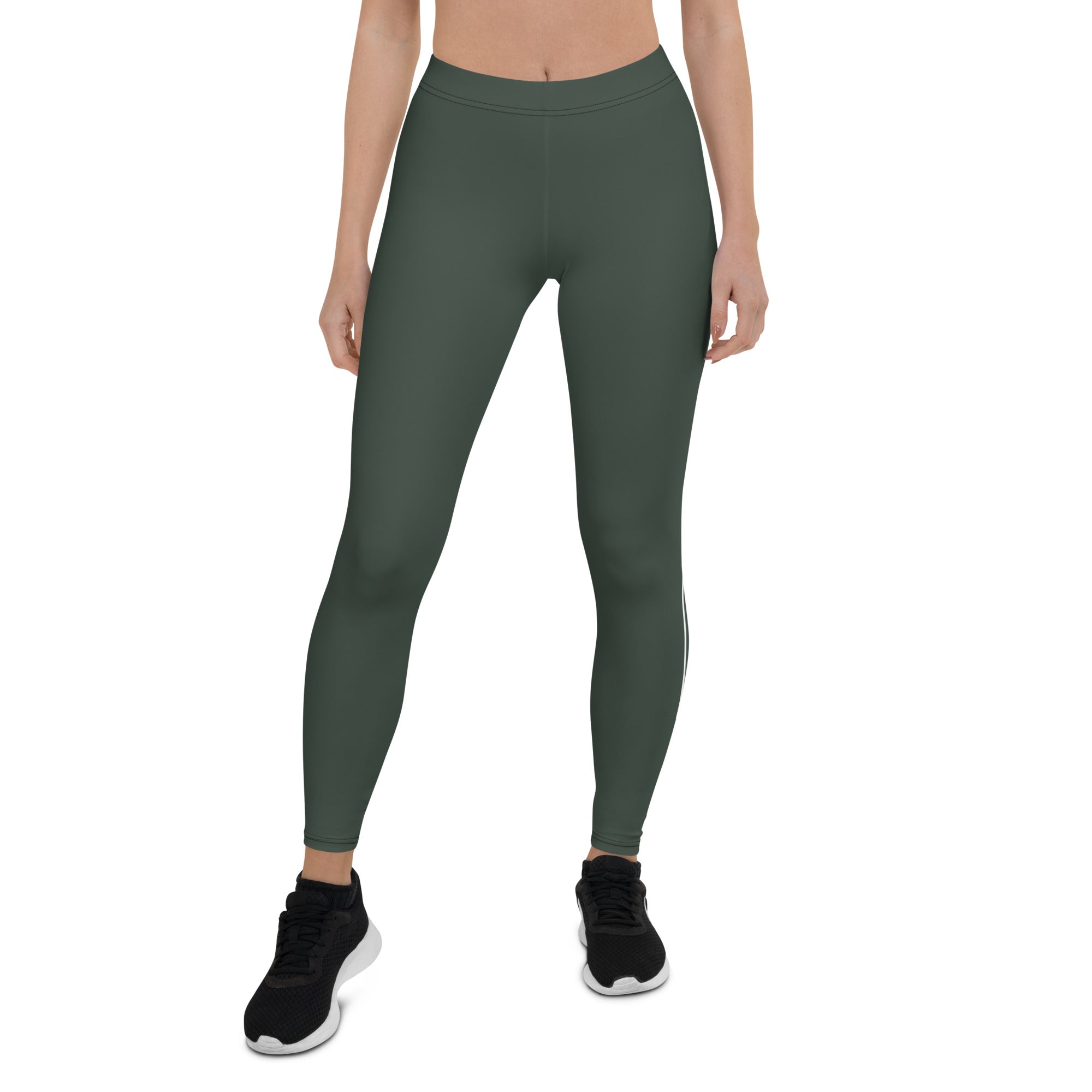 Elevate your everyday look with these Jade Ascent High-Waisted Leggings. The beautiful forest green shade with ascending lines is a stunning and unique addition to your wardrobe. The slim, high-rise fit flatters your figure, while the soft synthetic material with added stretch offers comfortable movement. 