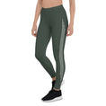 Load image into Gallery viewer, Elevate your everyday look with these Jade Ascent High-Waisted Leggings. The beautiful forest green shade with ascending lines is a stunning and unique addition to your wardrobe. The slim, high-rise fit flatters your figure, while the soft synthetic material with added stretch offers comfortable movement. 
