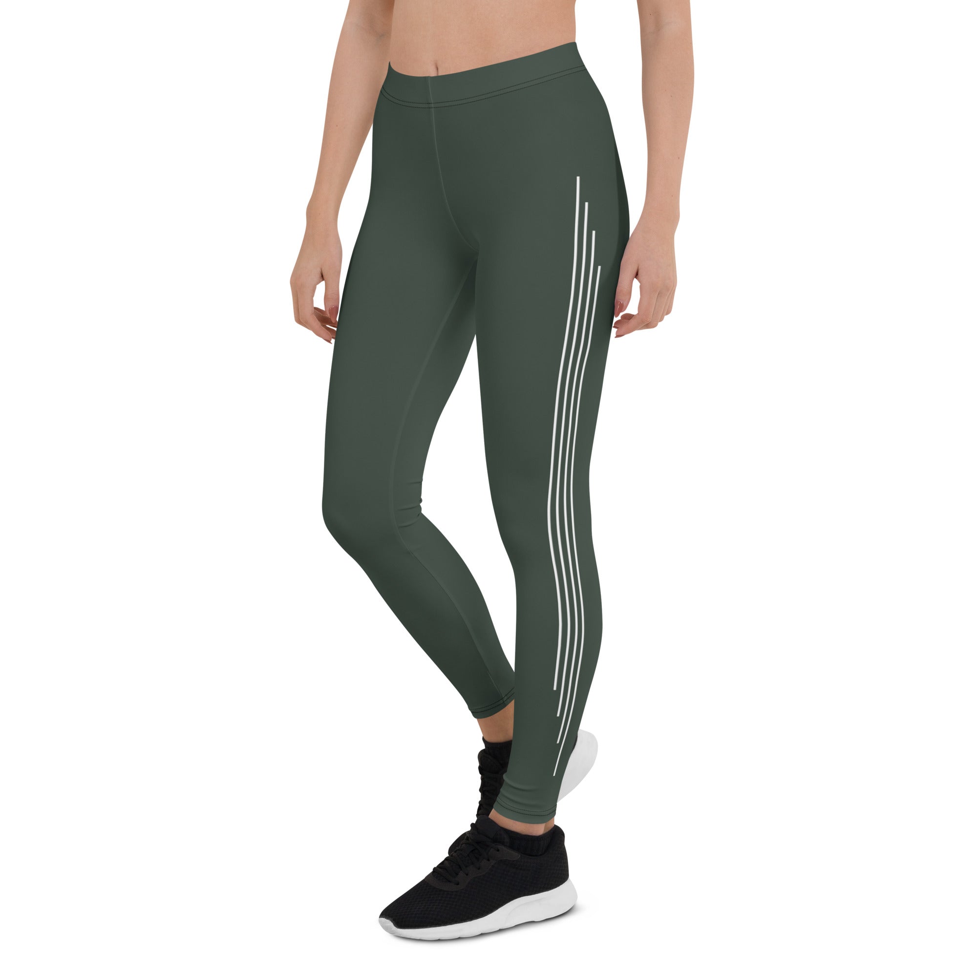 Elevate your everyday look with these Jade Ascent High-Waisted Leggings. The beautiful forest green shade with ascending lines is a stunning and unique addition to your wardrobe. The slim, high-rise fit flatters your figure, while the soft synthetic material with added stretch offers comfortable movement. 