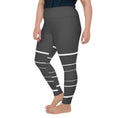 Load image into Gallery viewer, Introducing Elevated Essence plus size leggings, the perfect addition to your activewear collection! These leggings feature a flattering high-waisted design and a stretchy fit that hugs your curves in all the right places. The dark grey fabric is elevated by the striking white lines that add a touch of elegance to your workout look. Whether you're hitting the hiking trails, practicing yoga, or simply running errands, these leggings will keep you comfortable and confident. 
