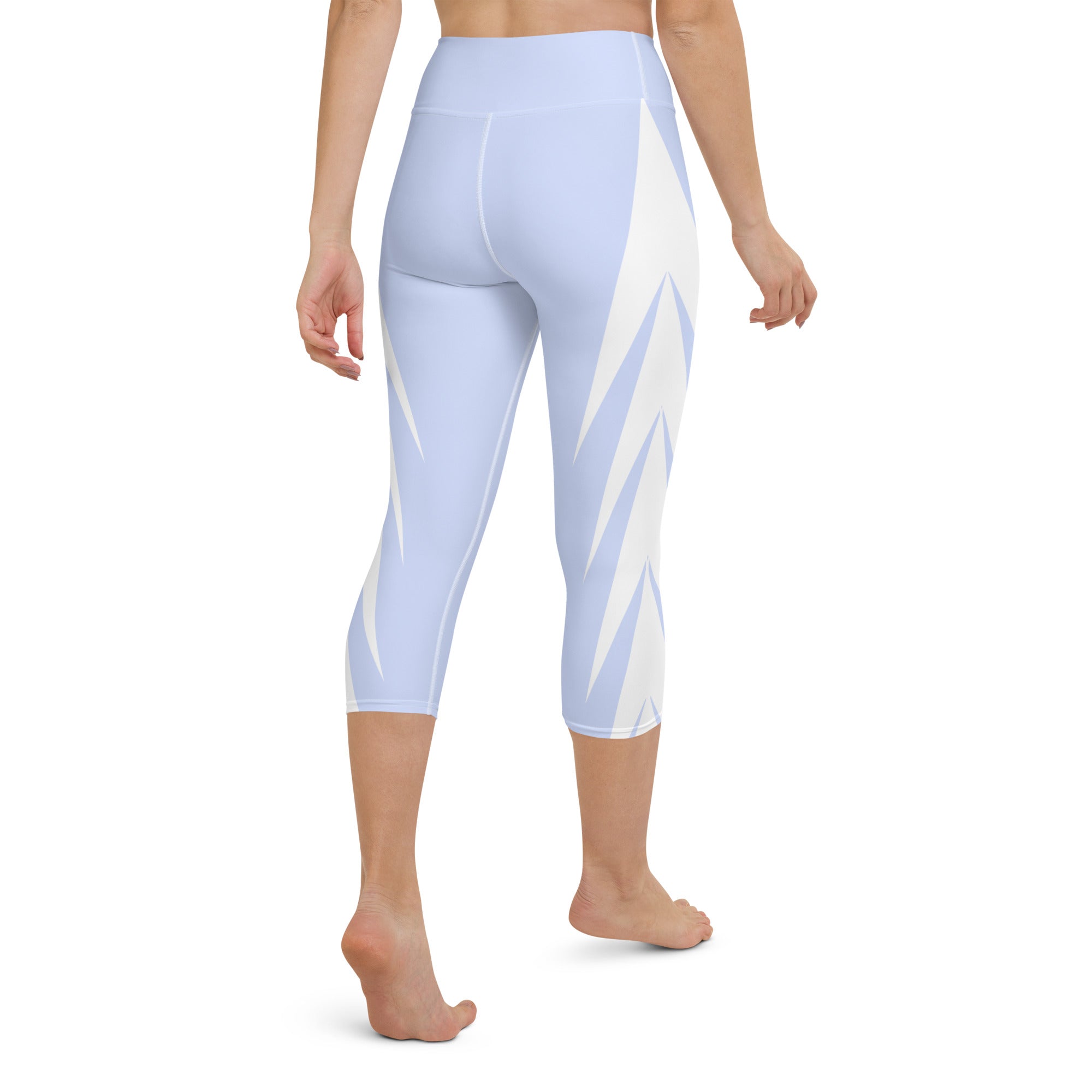 Experience ultimate comfort and style with our Altitude yoga capri leggings! Featuring a high, elastic waistband for a secure and flattering fit, these leggings are the perfect choice for any activity, from yoga to the gym or just lounging at home. Made with a super soft and stretchy microfiber yarn, these capris will ensure your comfort and flexibility no matter what the day brings.