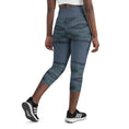 Load image into Gallery viewer, Looking for a pair of yoga capris that are both comfortable and stylish? Look no further than Blue Prism! Featuring a high, elastic waistband and a unique diamond scale pattern in various shades of blue, these capris provide a flattering fit and easy movement for any workout or lounging session.
