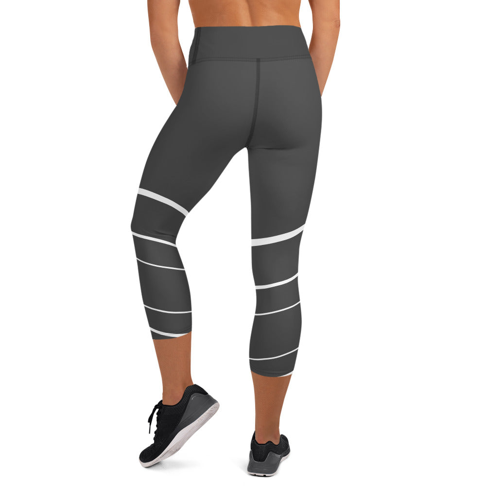 Elevate your active wardrobe with our Elevated Essence Yoga Capris. The sleek and comfortable design of these capris make them perfect for any activity, from hiking and biking to gardening and traveling. The high-quality fabric wicks away sweat and dries quickly, so you can stay comfortable during even the most intense workouts.