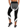 Load image into Gallery viewer, Introducing FiberFlex capri leggings, your go-to choice for gym workouts and everyday errands. These leggings are designed to make a bold statement while providing the comfort and support you need for any activity.
