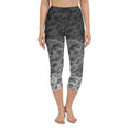 Load image into Gallery viewer, Introducing our Stealth Yoga Capri Leggings, the perfect blend of style, comfort, and performance. These leggings feature a unique camouflage gradient pattern, designed to make a statement while providing the versatility you need for any workout.
