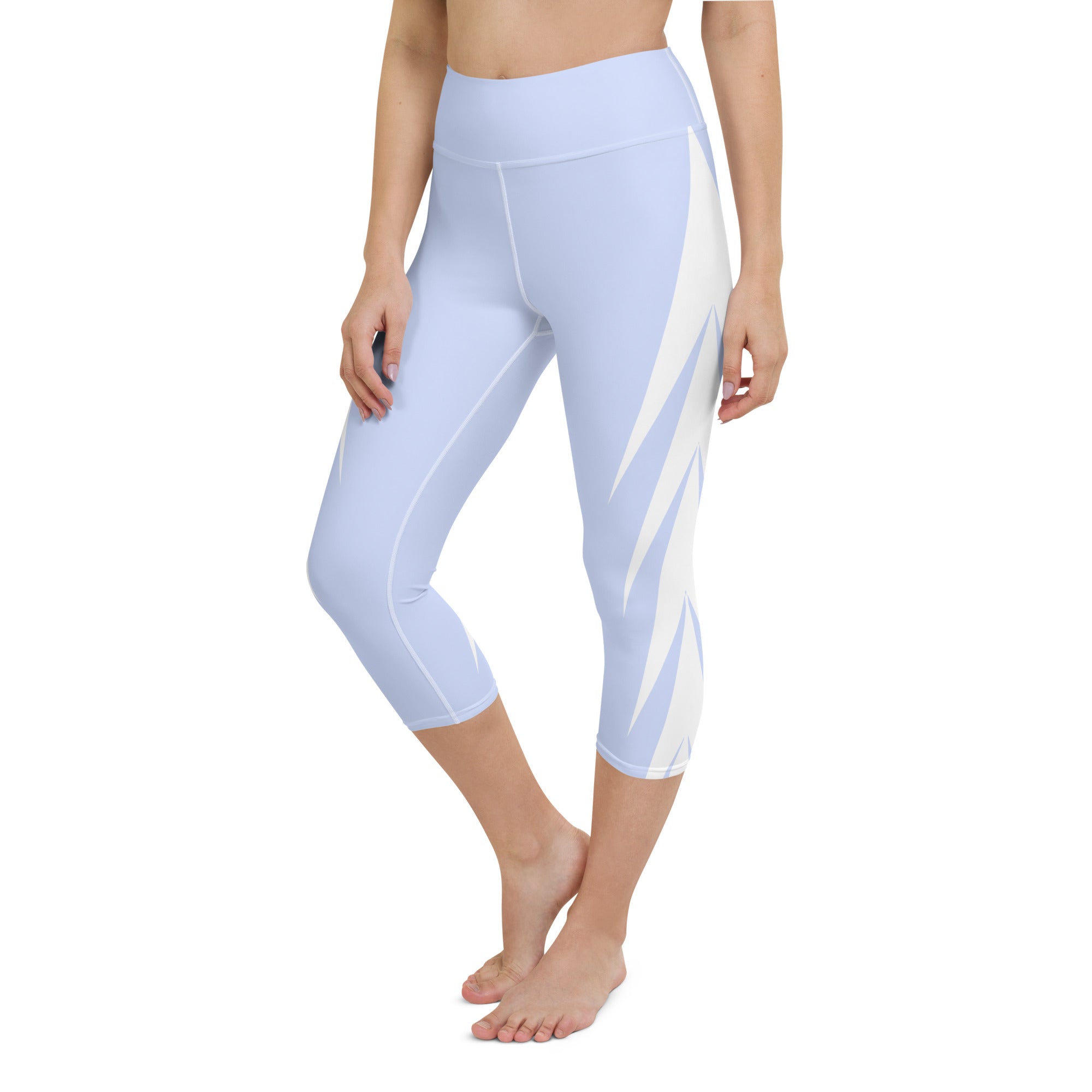 Experience ultimate comfort and style with our Altitude yoga capri leggings! Featuring a high, elastic waistband for a secure and flattering fit, these leggings are the perfect choice for any activity, from yoga to the gym or just lounging at home. Made with a super soft and stretchy microfiber yarn, these capris will ensure your comfort and flexibility no matter what the day brings.