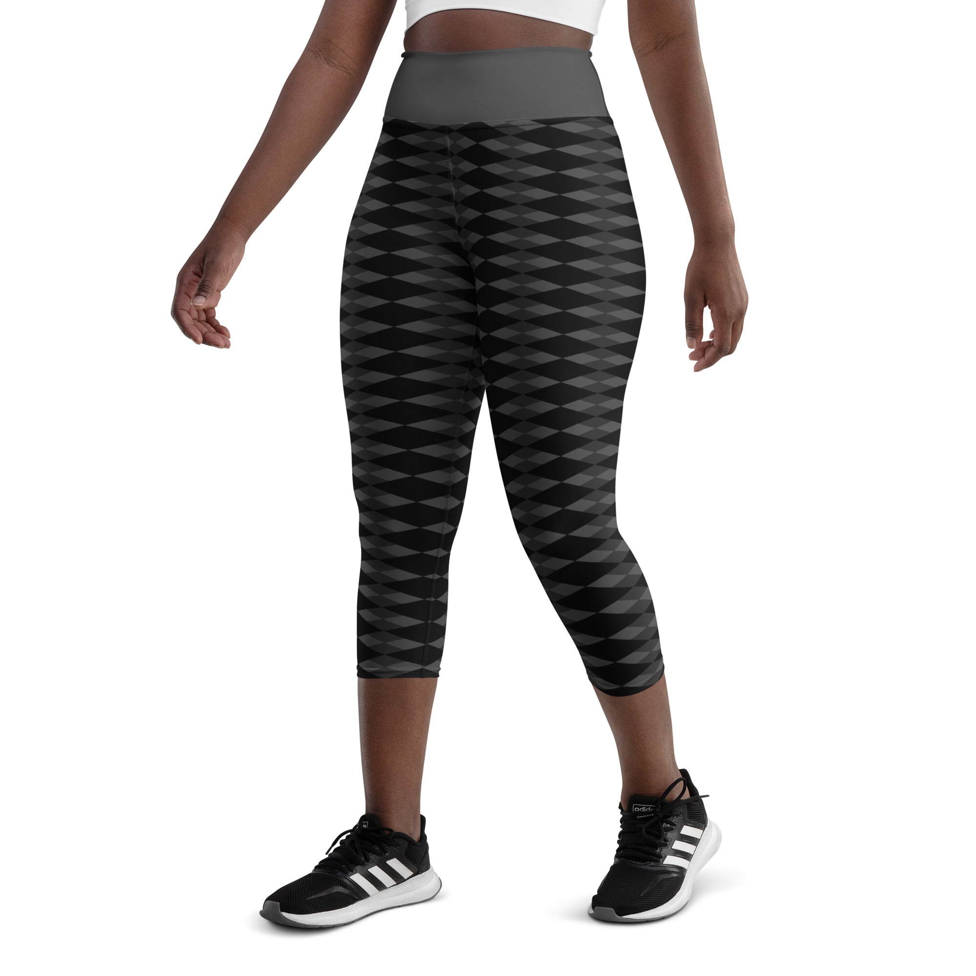 Experience the power and style of our Checkmate Yoga Capris. These capri leggings feature a captivating diamond checkerboard pattern that will elevate your activewear collection to new heights. Embrace the winning spirit of Checkmate as you conquer your yoga practice and surpass your own expectations.