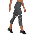 Load image into Gallery viewer, Elevate your active wardrobe with our Elevated Essence Yoga Capris. The sleek and comfortable design of these capris make them perfect for any activity, from hiking and biking to gardening and traveling. The high-quality fabric wicks away sweat and dries quickly, so you can stay comfortable during even the most intense workouts.
